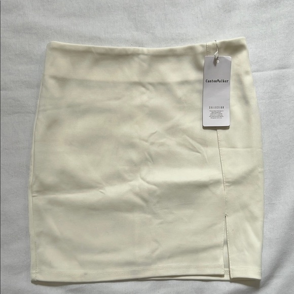 Canton Walker Dresses & Skirts - NWT Canton Walker BodyCon Cream Mini Skirt
